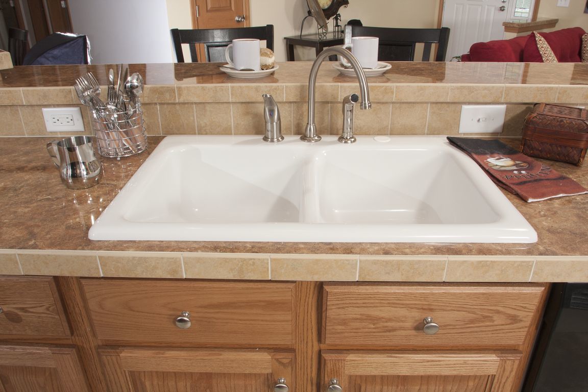 white acrylic kitchen sink